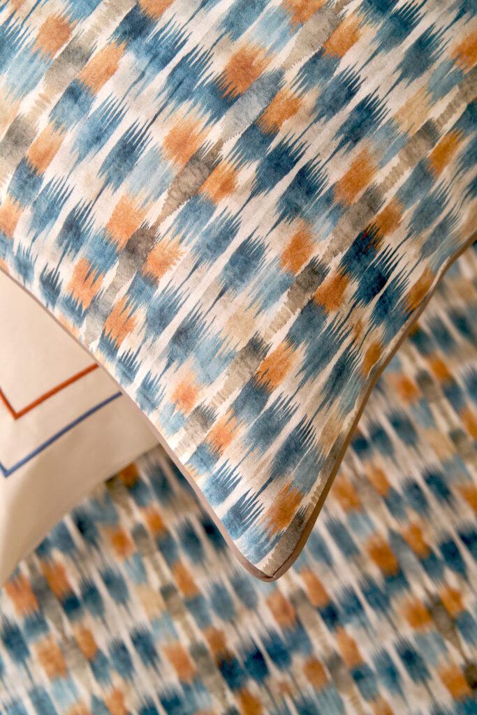 Luxury bed linen Giselle in 100% ELS cotton sateen 300TC with geometric print in moonlight blue, chili and beach, by NOMO.