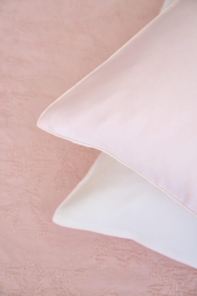 NOMO Solène bedding detail in Ivory and Powder with fine piping