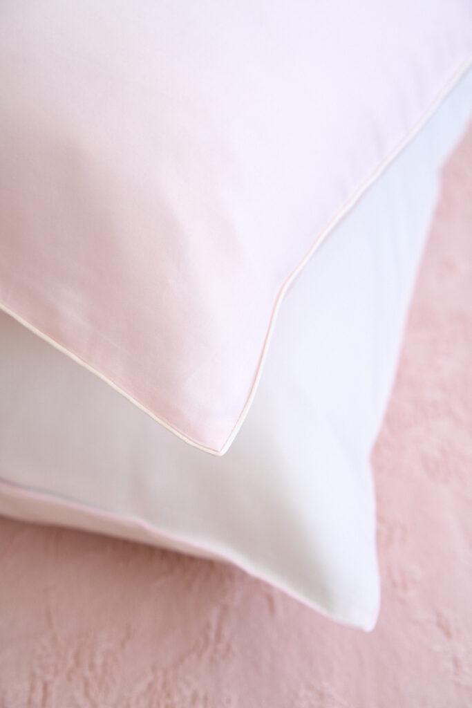 NOMO Solène bedding detail in Ivory and Powder with fine piping