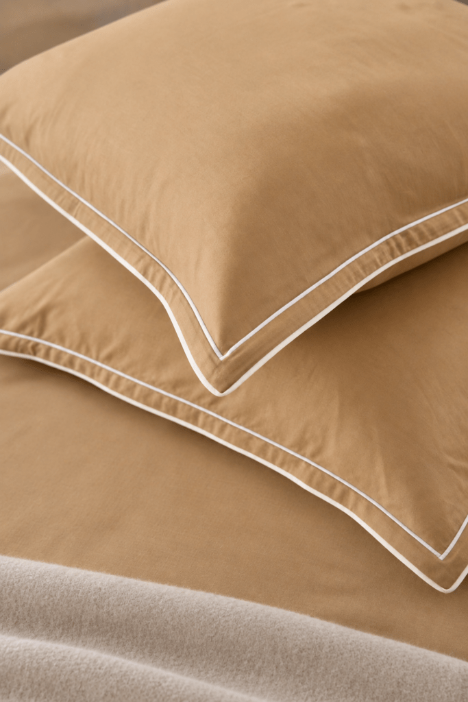 NOMO Sublime Biscuit and Buttermilk bedding detail with piping